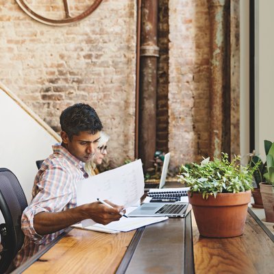 FIOS7006_Man_At_Desk_4C-reduced.jpg